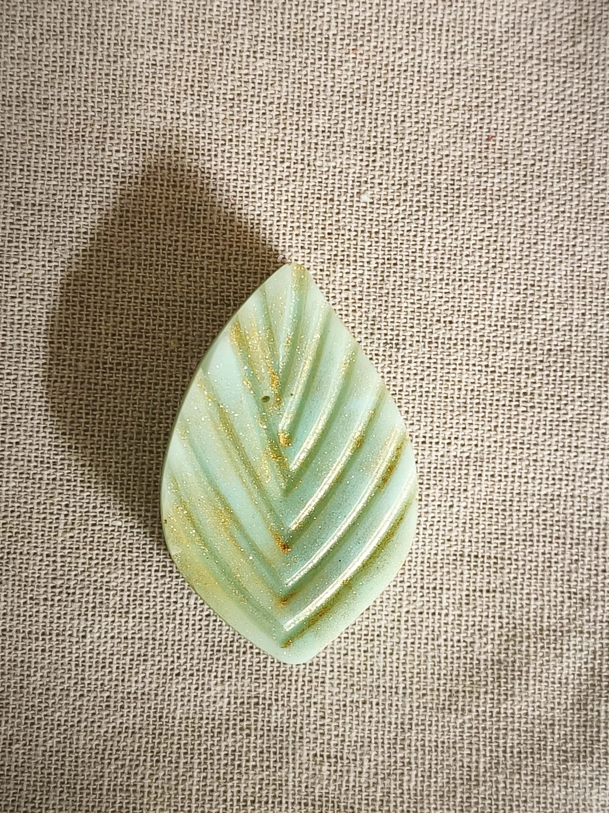 Fondant parfumé Thé Vert - gros plan texture et reflets dorés